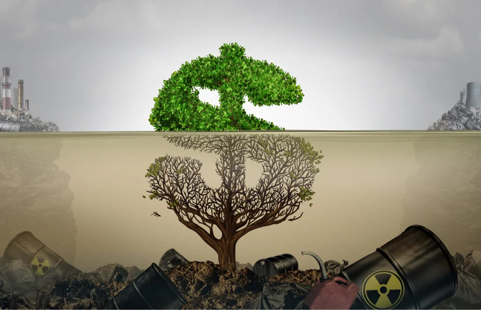 A green bush shaped like a dollar sign hides dead roots surrounded by toxic waste beneath the water
